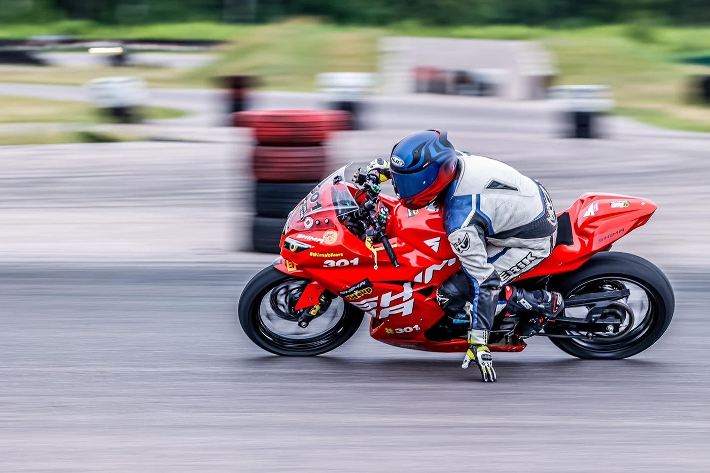 Kamil riding on a racetrack